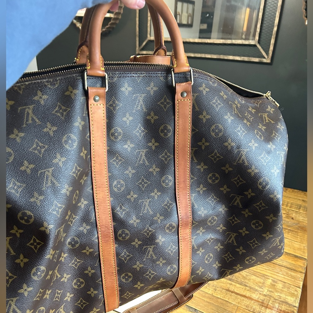 LV monogram Keepall Bandoulière 55. Carry on size.